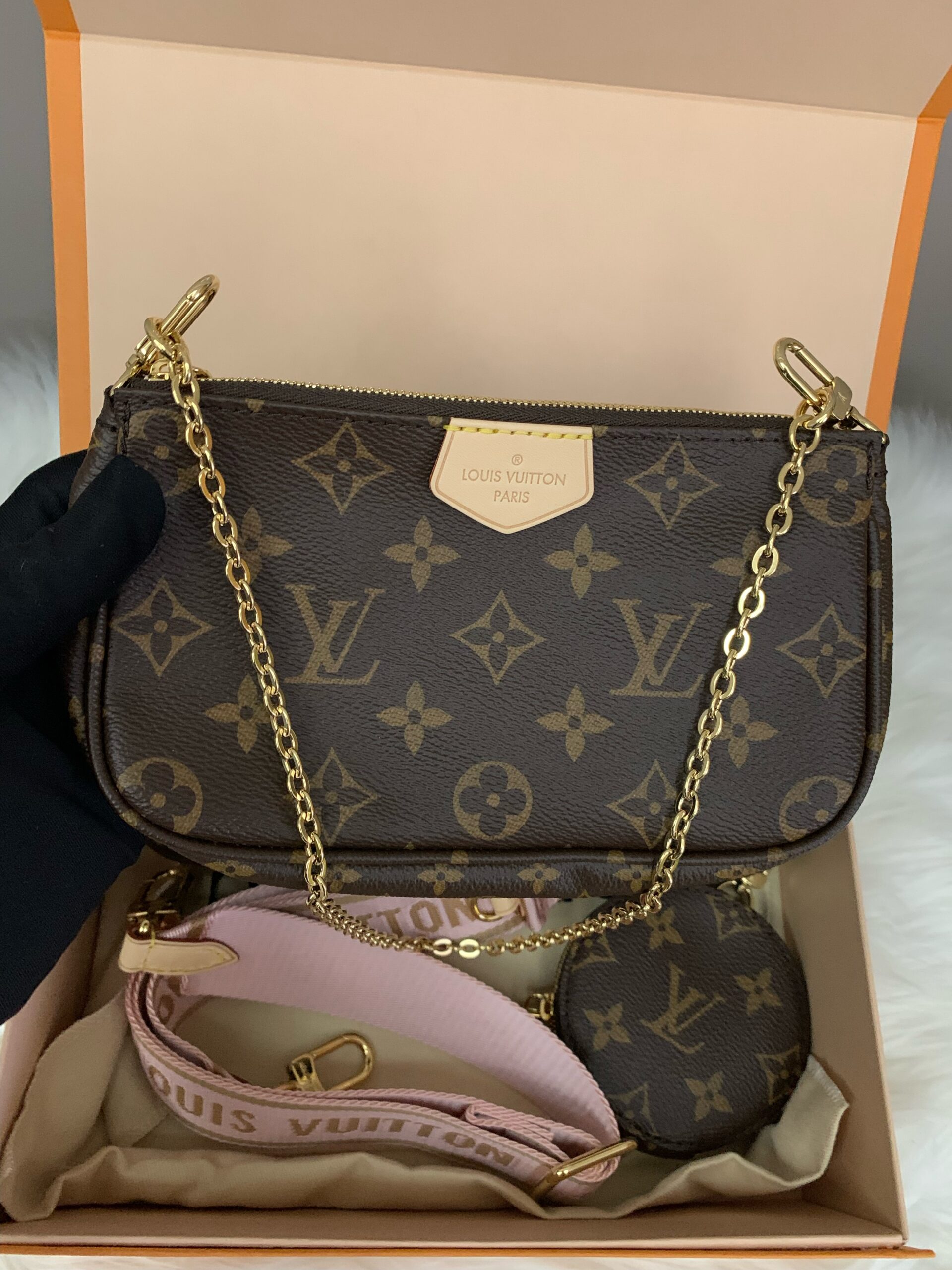 Pochette accessoire leather handbag Louis Vuitton Multicolour in Leather -  34688570